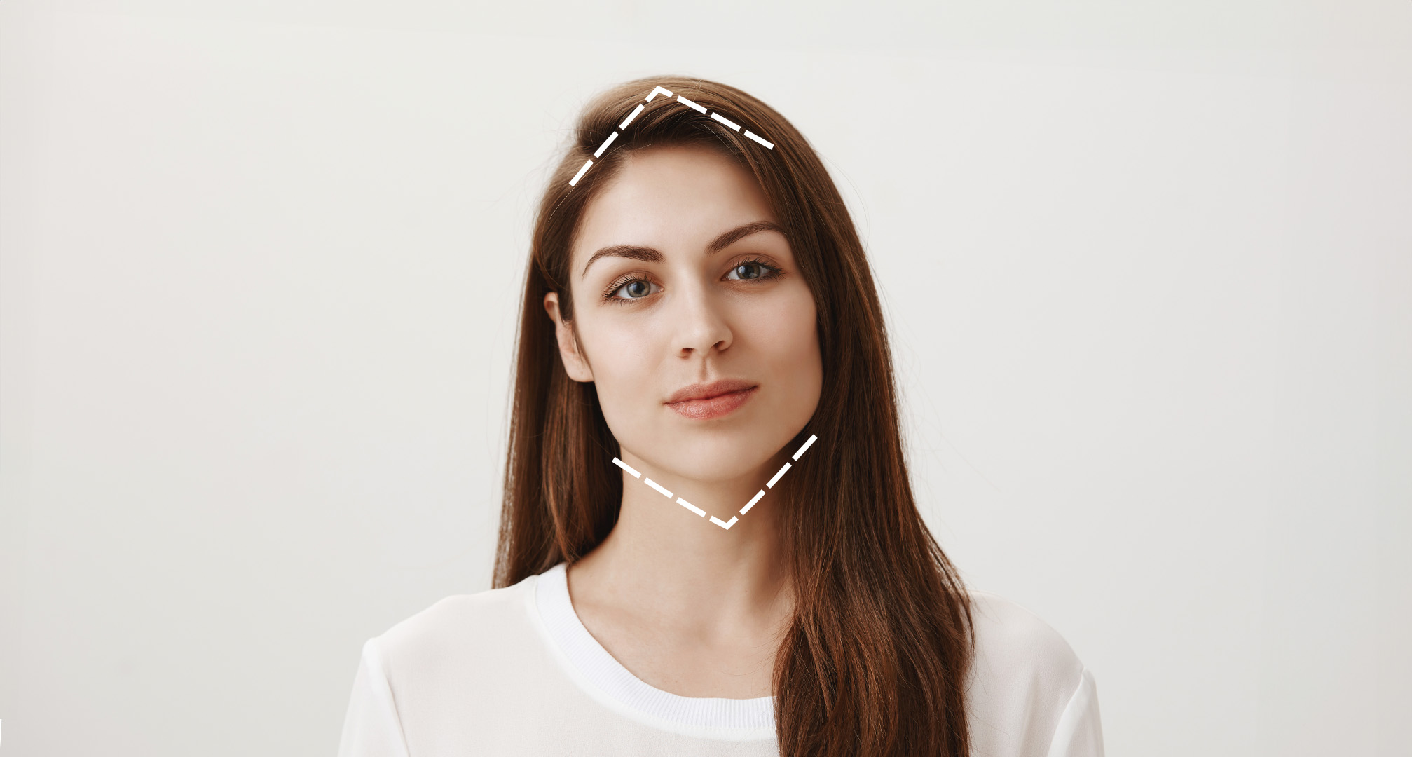 punktyrinė deimanto formos linija aplink veidą, iliustruojanti veido formą